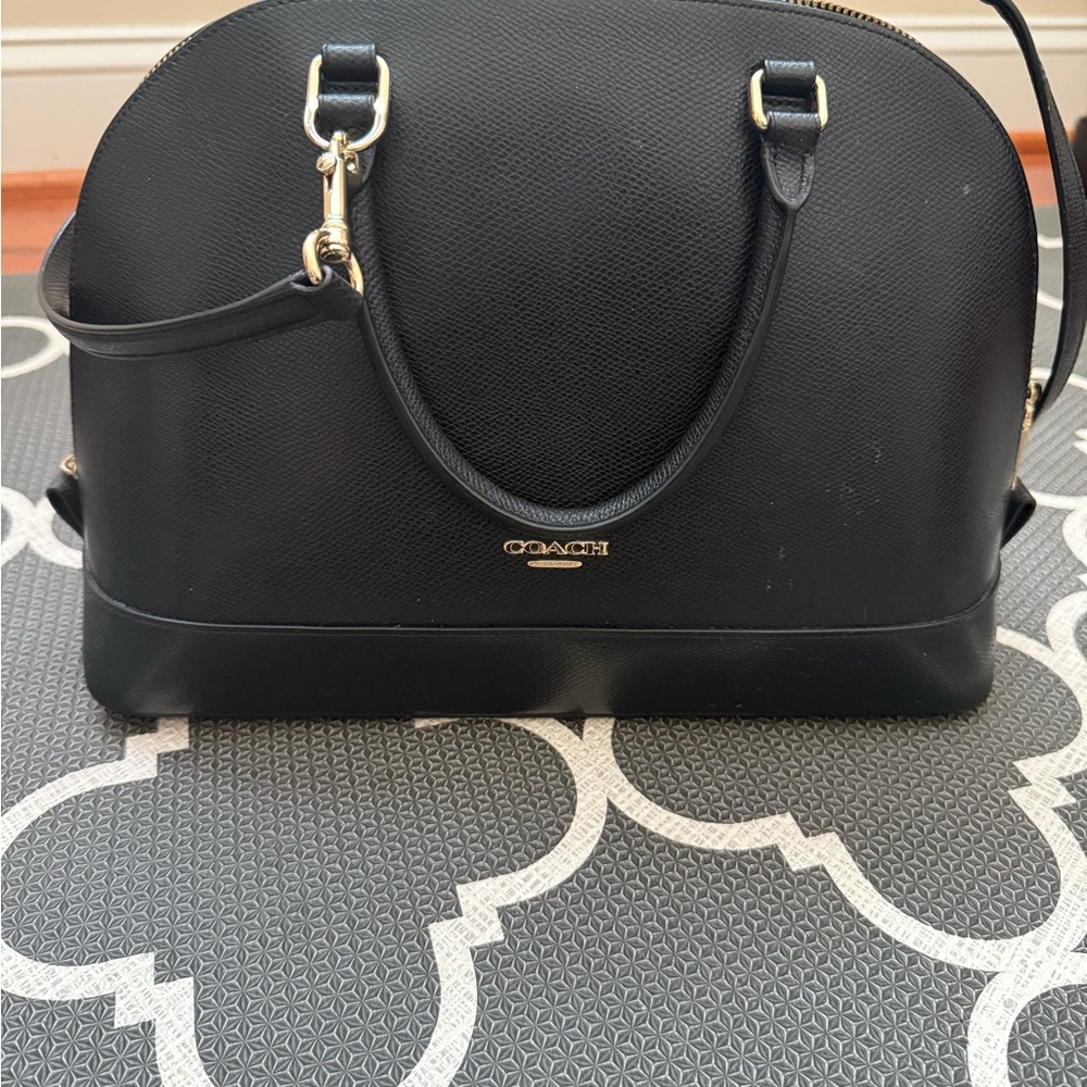 Coach Black Satchel with Gold Hardware and Structured Design